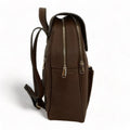 Brown leather women’s backpack with stylish design, premium genuine leather finish, and laptop compartment — perfect for everyday use, work, or travel.
