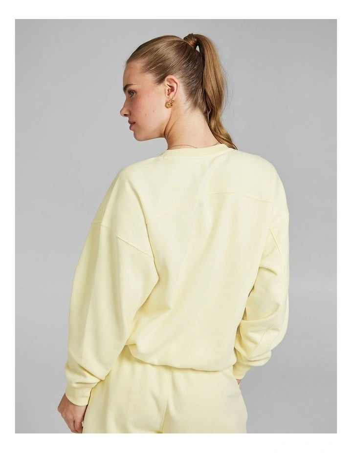 “Rockwear fleece crewneck sweater in sunflower yellow”