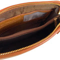 Elegant brown leather clutch bag with detachable shoulder strap, crossbody design, and premium stitching — LeatherLuxe women’s handbag.