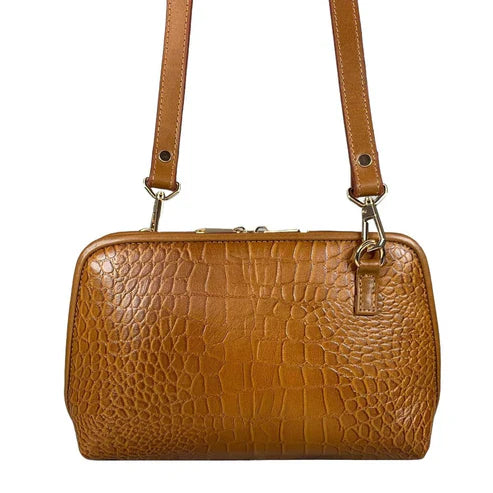 Light brown leather clutch bag with crocodile-style texture, crossbody shoulder strap, and elegant design — LeatherLuxe women’s handbag.