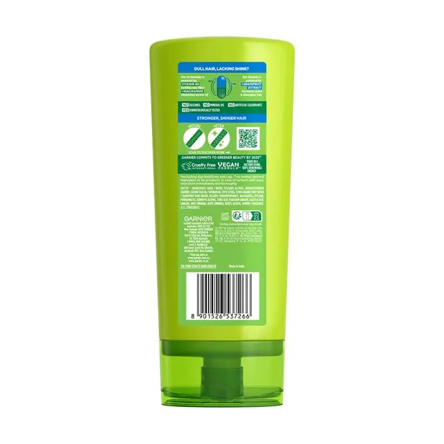 Garnier Fructis conditioner bottle with green label on a white background
