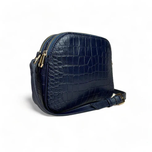 Dark blue genuine leather women’s shoulder bag with crossbody strap, elegant design, and premium finish — LeatherLuxe collection.