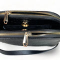 LeatherLuxe black leather women's shoulder bag and crossbody purse with sleek design and gold-tone hardware