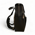 LeatherLuxe black leather women’s backpack with sleek minimalist design, adjustable shoulder straps, and gold hardware — perfect for work, travel, or everyday style.