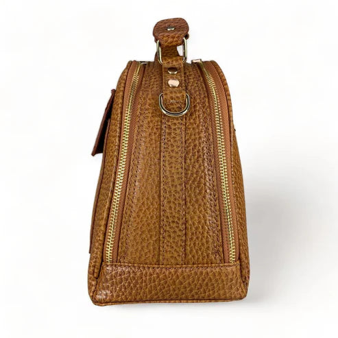 LeatherLuxe light brown leather tote bag with classic design, elegant stitching, and versatile style for everyday use.