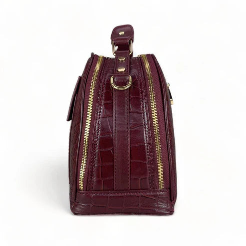 Red leather women's handbag – premium satchel and shoulder bag with elegant stitching, gold-tone hardware, and adjustable strap – luxury fashion accessory for women.