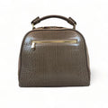 Elegant khaki leather handbag for women with shoulder strap and top handle, perfect for casual and formal outfits.