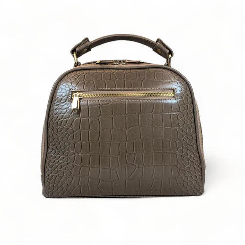 Elegant khaki leather handbag for women with shoulder strap and top handle, perfect for casual and formal outfits.