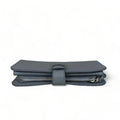 Genuine gray leather clutch with matching card holder, stylish and elegant women’s accessory for everyday and formal occasions.