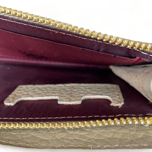 Elegant premium cream leather clutch by LeatherLuxe with sleek design and built-in phone compartment – luxury women’s accessory for everyday and evening use.