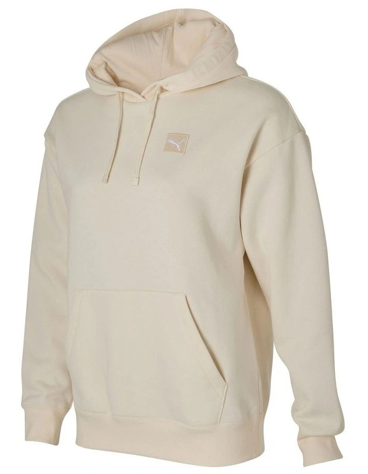 Puma Ess Elevated Badge Hoodie black with embroidered Puma logo, adjustable hood, and ribbed cuffs