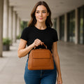 LeatherLuxe light brown leather tote bag with classic design, elegant stitching, and versatile style for everyday use.