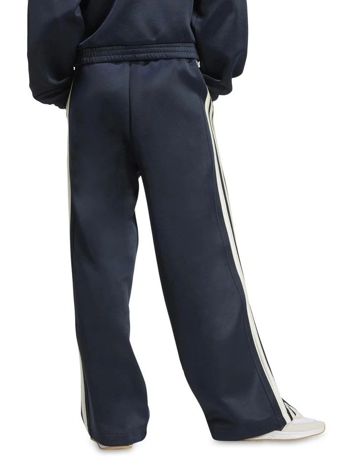 Navy tracksuit with white stripes and Adidas logo on a white background