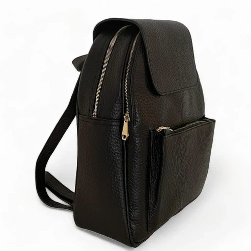 LeatherLuxe black leather women’s backpack with sleek minimalist design, adjustable shoulder straps, and gold hardware — perfect for work, travel, or everyday style.